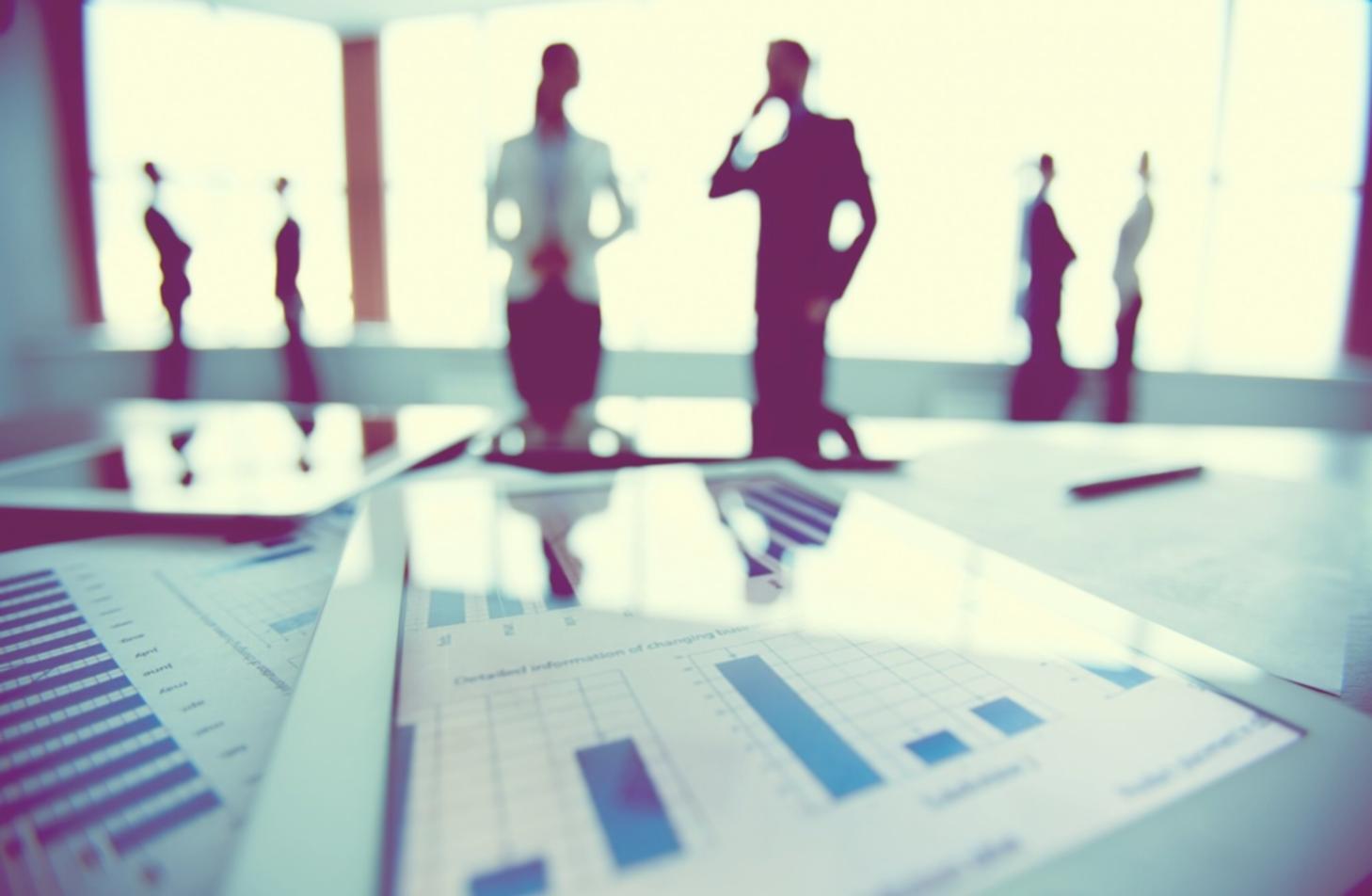 Professional business meeting discussing expansion opportunities